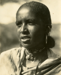 An Abyssinian woman with the customary braids. The South Omotic influence can again be seen in the coarse hair texture and slightly flaired nostrils