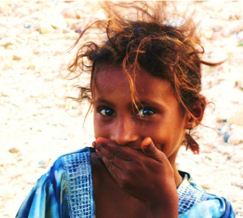 A Socotri girl. Reddish hair is found among a significant minority of Socotri, Jews and other Semitic individuals, having been recently acquired from Indo-European-speaking groups (among whom the trait appears to have originated). Red hair has also been observed among ancient Egyptian and Meroitic specimens. However, the incidence of red hair in the Nile Valley likely stems instead from older contacts with European populations (e.g., the original bearers of the paternal haplogroup R1b) since the trait has not been observed among ancient Levantine individuals dating from the Bronze Age and early periods (cf. Lazaridis et al. (2022), Supplementary Materials).