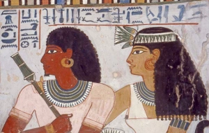 Ancient Egyptian mural of the nobleman Sennefer and his wife Merit (18th Dynasty). Sennefer is depicted with the amrani/mariin phenotype.