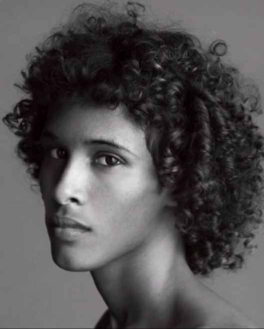 A Somali man, retaining the fine features, facial orthognathism and soft-textured hair of his Cushitic ancestors.